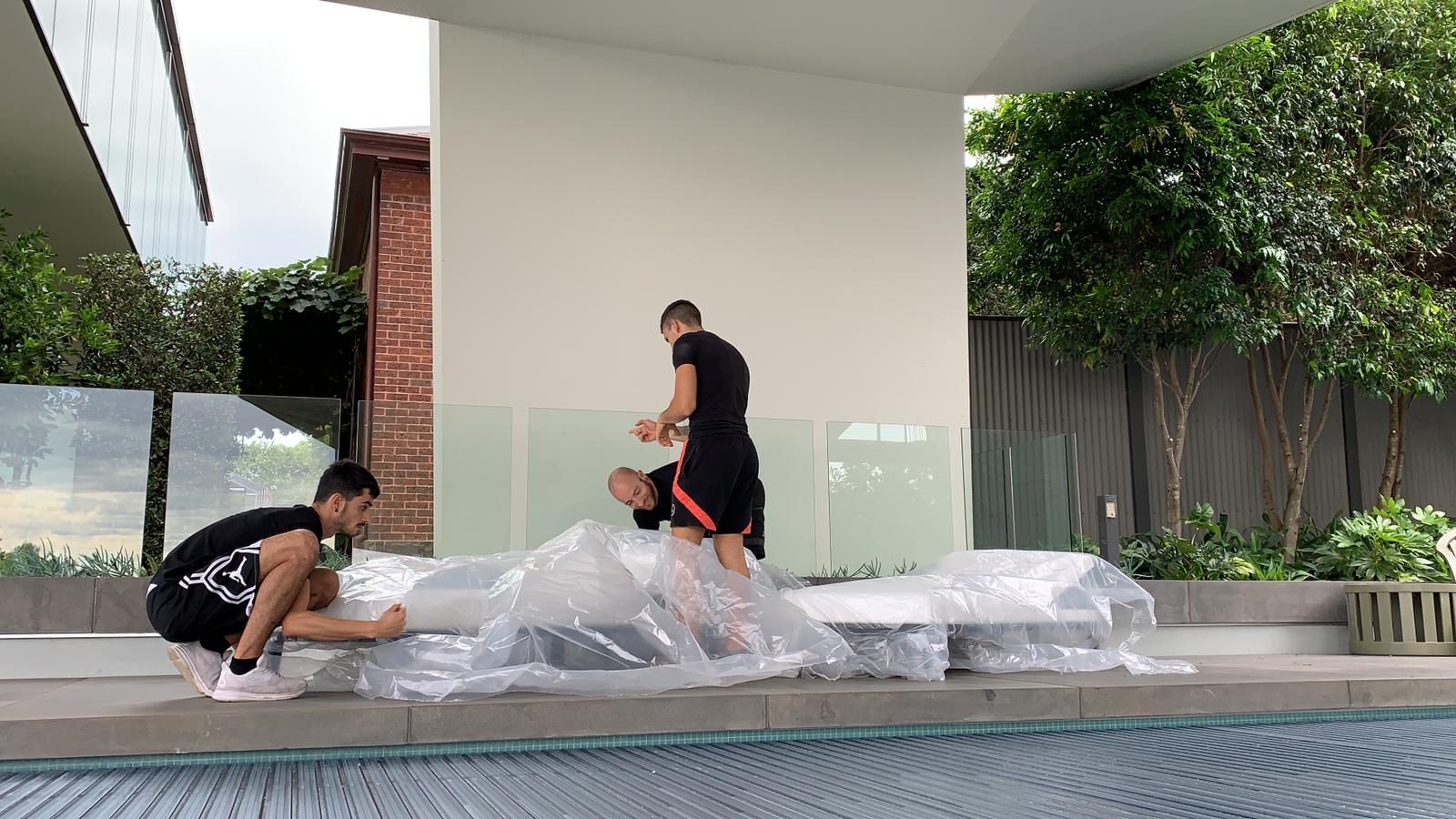 On site with the crew: Working the piece into position, Melbourne